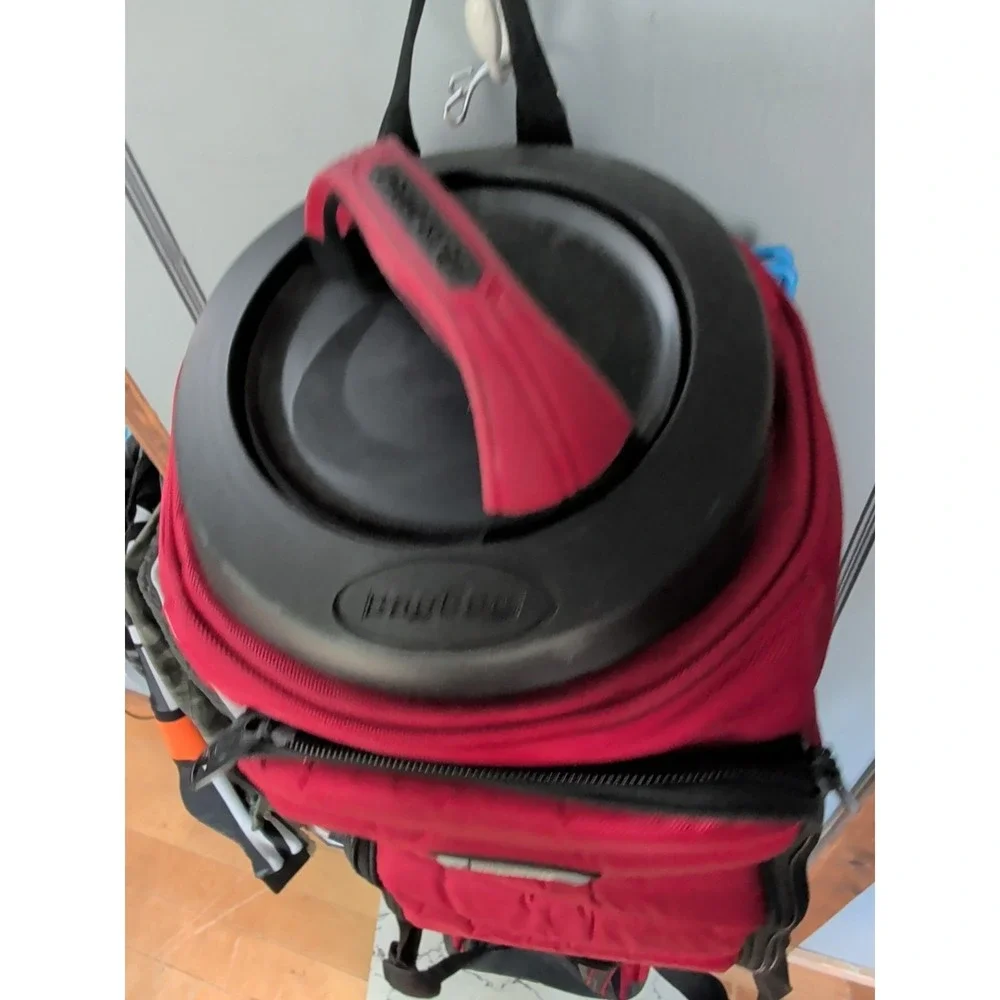 Used Bag Boy Golf Travel Case With Pivot Grip & Wheels - Black and Red